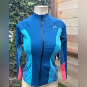 Rip Curl Women's zip up rash guard top. New with tags. Size medium